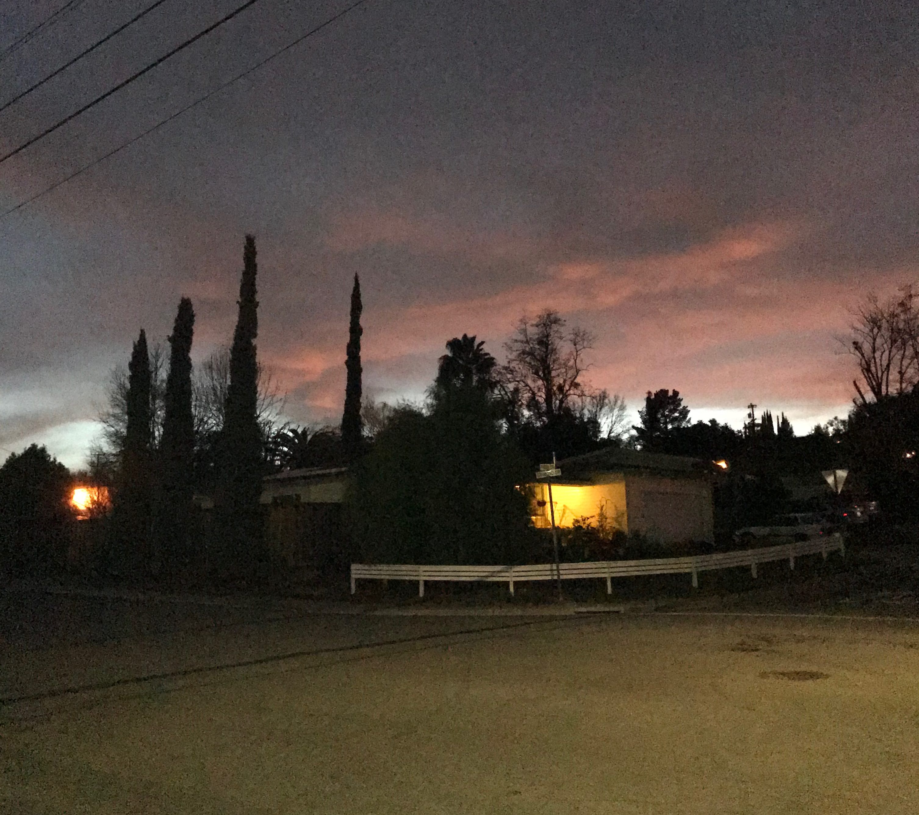 Electric porch light at dusk